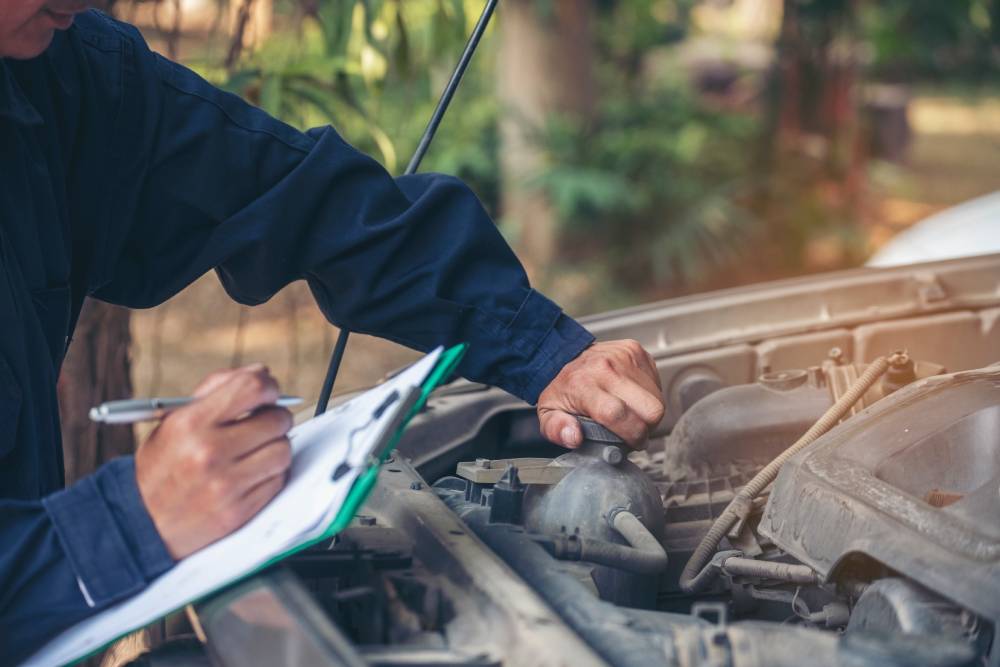 Mechanic car service auto garage in automotive mobile center. Technician workshop repair engine motor vehicles service mechanical engineering business. Automobile mechanic hands car repairs technic